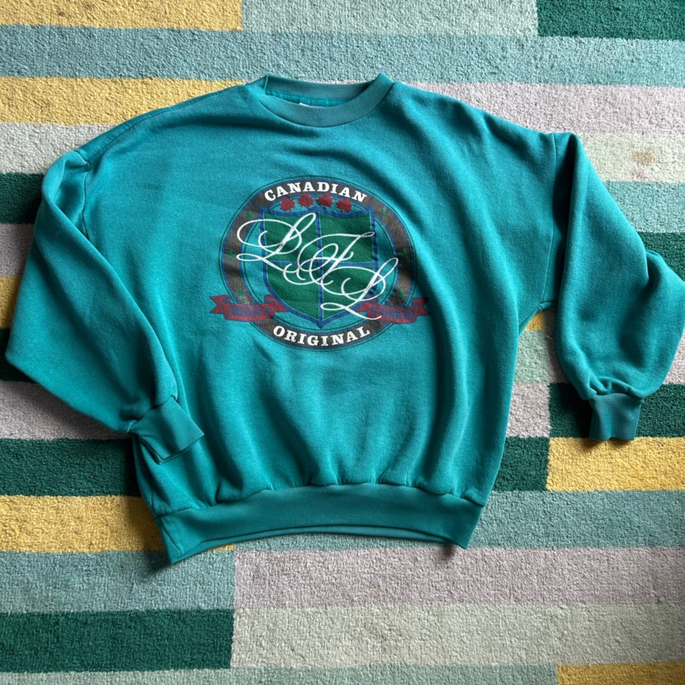 Vintage Lady Foot Locker Teal Canadian Original Sweater - size large